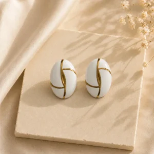 boucles d'oreilles ovales blanches & dorées – Élégance intemporelle